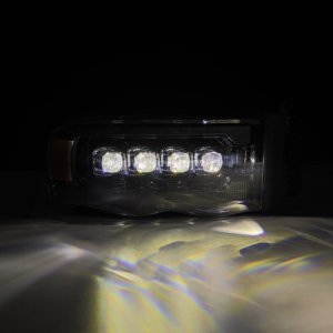 Dodge Ram 1500 Headlights - AlphaRex - NOVA LED Projector with Activ Light/Sequential Signal - Alpha Black - `02-`05