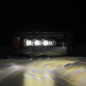 Dodge Ram 1500 Headlights - AlphaRex - NOVA LED Projector with Activ Light/Sequential Signal - Alpha Black - `02-`05