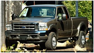 Ford F-250 Super Duty Fender Flares - Front + Rear - Bushwacker - Pocket Style - Black - `99-`07