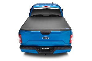 Ram 1500 Tonneau Cover - LUND - Hard Fold - Black - `02-`17