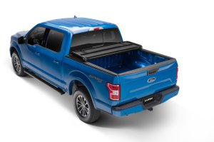 Ram 1500 Tonneau Cover - LUND - Hard Fold - Black - `02-`17