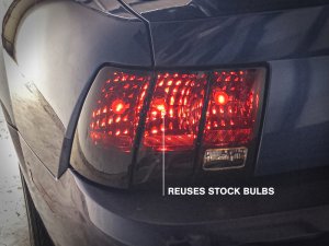 Ford Cobra LED Taillights - Raxiom - Black Housing - Smoked Lens - `99-`01