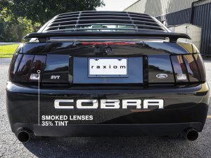 Ford Cobra LED Taillights - Raxiom - Black Housing - Smoked Lens - `99-`01