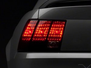 Ford Mustang LED Taillights - Raxiom - Black Housing - Smoked Lens - `99-`04