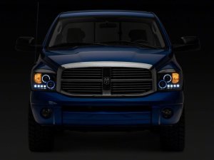 Dodge RAM 1500 LED Halo Projector Headlights - Raxiom - Black Housing with Clear Lens - Black - `06-`08