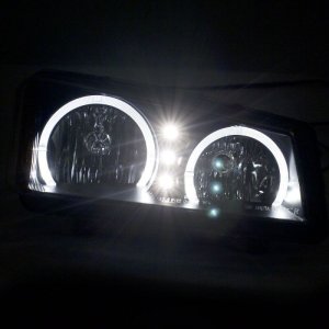 Chevrolet Silverado 1500 LED Headlights - Raxiom - Dual LED Halo Projector - Black - `03-`06