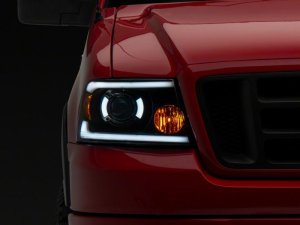 Ford F-150 LED Headlights - Raxiom - Axial Series Projector with SEQL LED Bar - Black Housing with Clear Lens - `04-`08