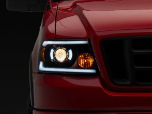 Ford F-150 LED Headlights - Raxiom - Axial Series Projector with SEQL LED Bar - Black Housing with Clear Lens - `04-`08