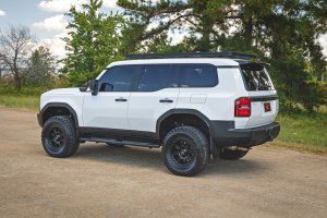 Toyota Land Cruiser Side Steps - Oval Nerf Bars - Rough Country - 2024+