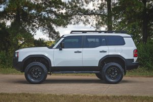 Toyota Land Cruiser Side Steps - Oval Nerf Bars - Rough Country - 2024+