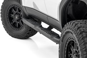 Toyota Land Cruiser Side Steps - Oval Nerf Bars - Rough Country - 2024+