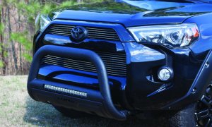 Toyota Tacoma Bull Bar - LUND - 3.5 Inch Oval with Integrated 20 Inch LED Light Bar - Black - `05-`15