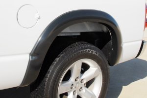 Toyota Tacoma Fender Flares (2 Pc) - Rear - LUND - SX-Sport Style Smooth Elite Series - Black - `16-`17