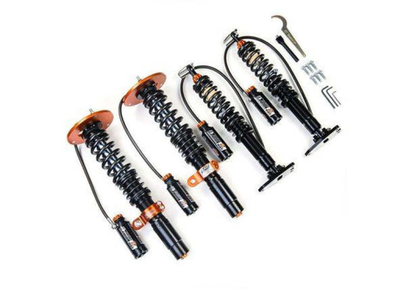 BMW 1 Series Coilover Suspension Kit - Front + Rear - AST - 5200 Comp Series, 2-Way Adjustable (Rebound/Compression), Monotube with Remote Reservoirs, Inverted Strut, Ride Height Adjustable, Camber-Adjustable Front Top Mounts, Solid Rear Top Mounts, Sprin