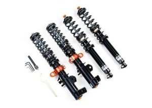 BMW M4 Coilover Suspension Kit - Front + Rear - AST - 5100 Competition Series (1-Way Rebound Adjustable, Monotube, Springs Included, Camber-Adjustable Front Top Mounts, Solid Rear Top Mounts) - `21-`27