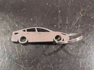 Tesla Model Y Keychain - Silhouette Design Tesla Model Y Keychain - Silhouette Design