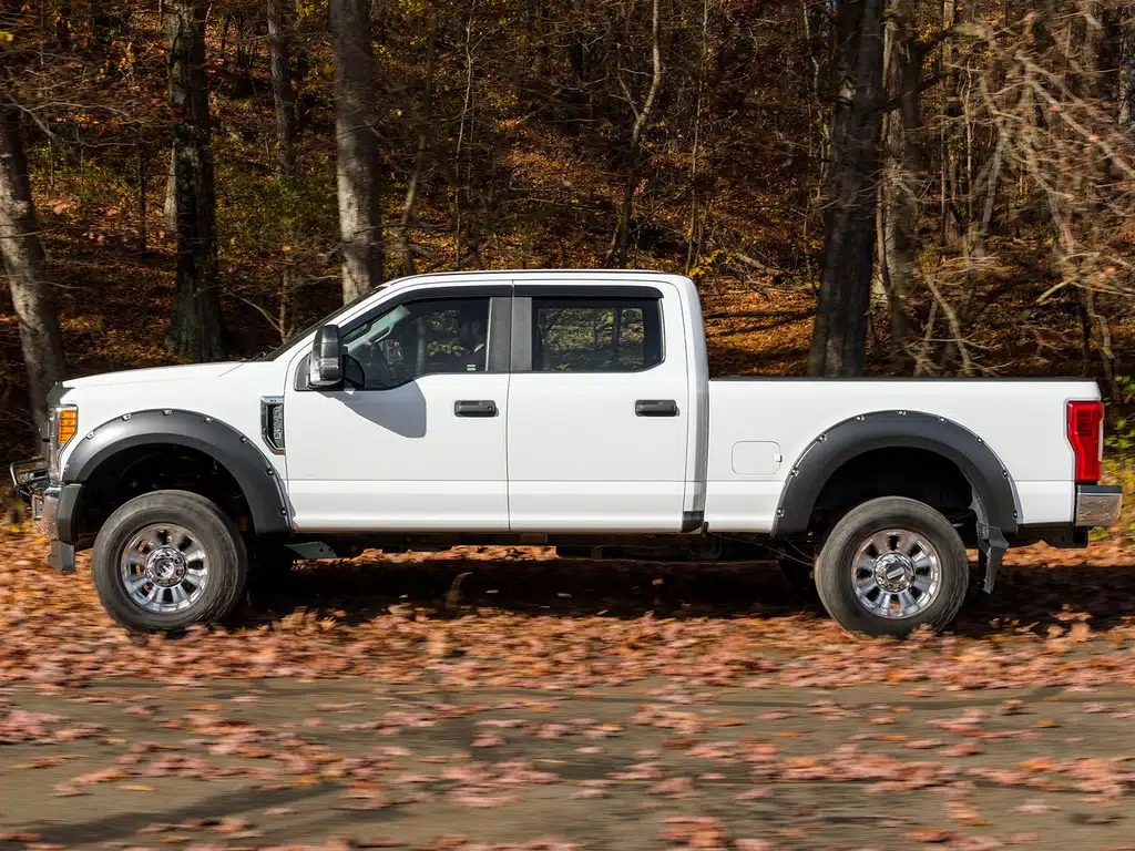Chevrolet Silverado 1500 Mud Flaps - Rear - Bushwacker - Trail Armor, Pocket/Rivet Style - Black - `19-`22